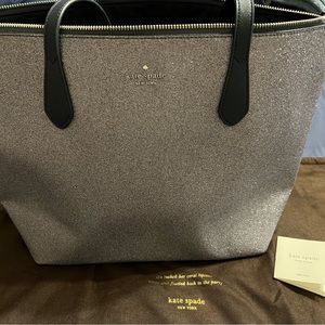 Kate Spade Joeley glitter tote in dusk navy. Only used once. Stored in dust bag.